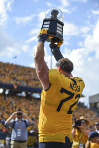 WVU builds big lead, holds on to beat No. 15 Virginia Tech 27-21